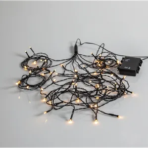Lampki choinkowe LED 64 diody 8 linii na baterie Timer Białe Ciepłe IP44